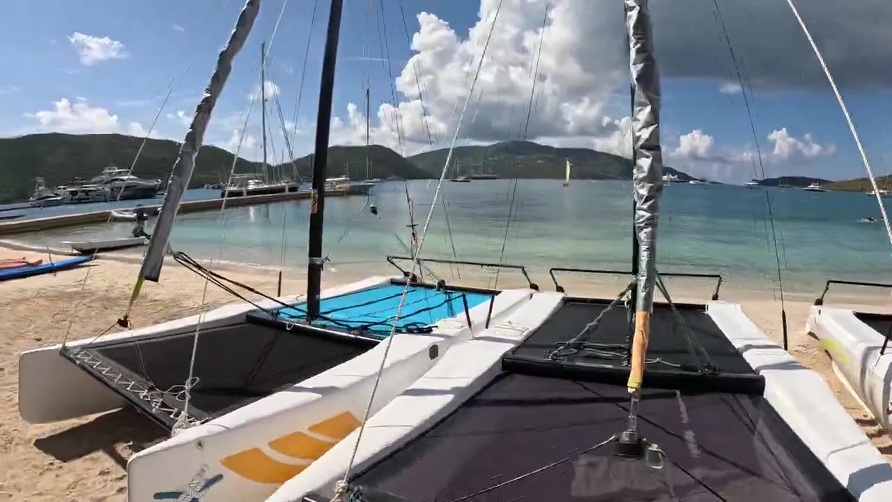 Hobie Cat catamarans pulled up on the watersports beach at the Bitter End Yacht Club, North Sound, Virgin Gorda