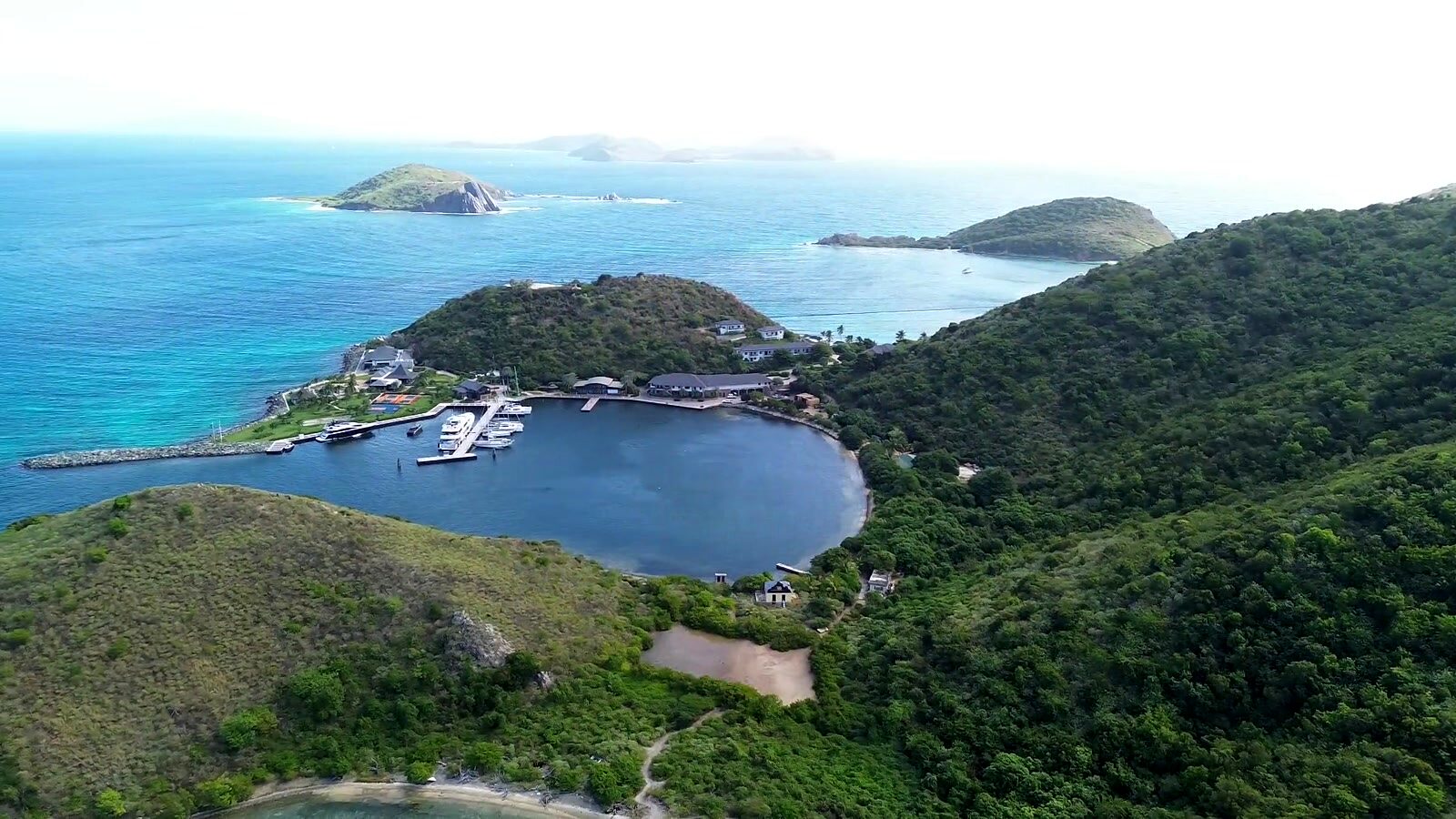Peter Island Resort and the sheltered water beside it, from the air, BVI
